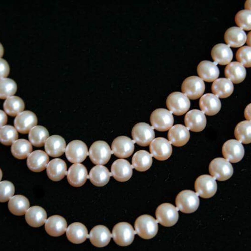 64" long freshwater pinky peach pearl necklace